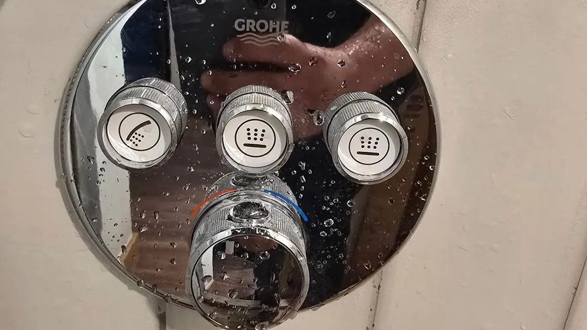 Digital shower valve controls in a tiled shower