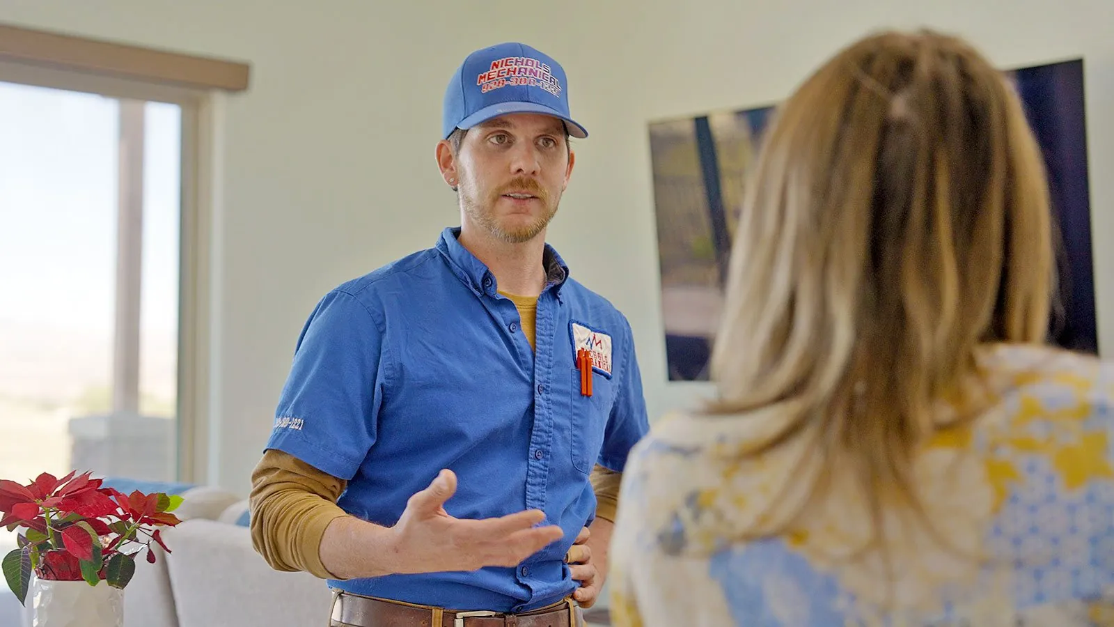 Nichols technician with a homeowner