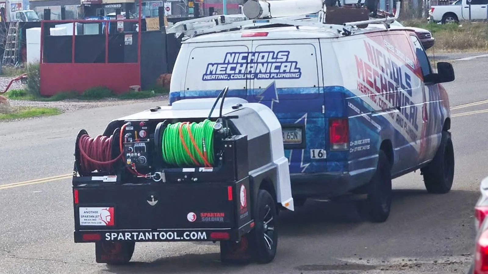 Nichols service van with a hydro jetting trailer
