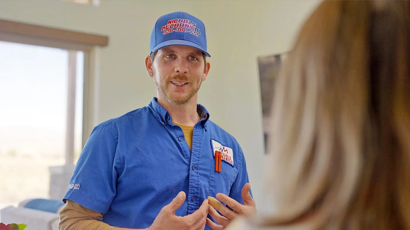 Nichols technician with a customer